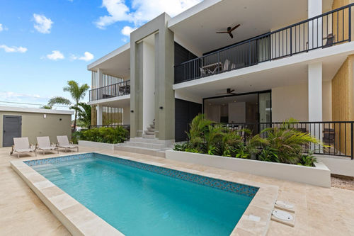 Últimas noticias de la empresa sobre Proyecto de villas en el Caribe: Mejorar la vida tropical con ventiladores de techo de madera maciza